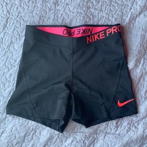 black/ hot pink nike pros